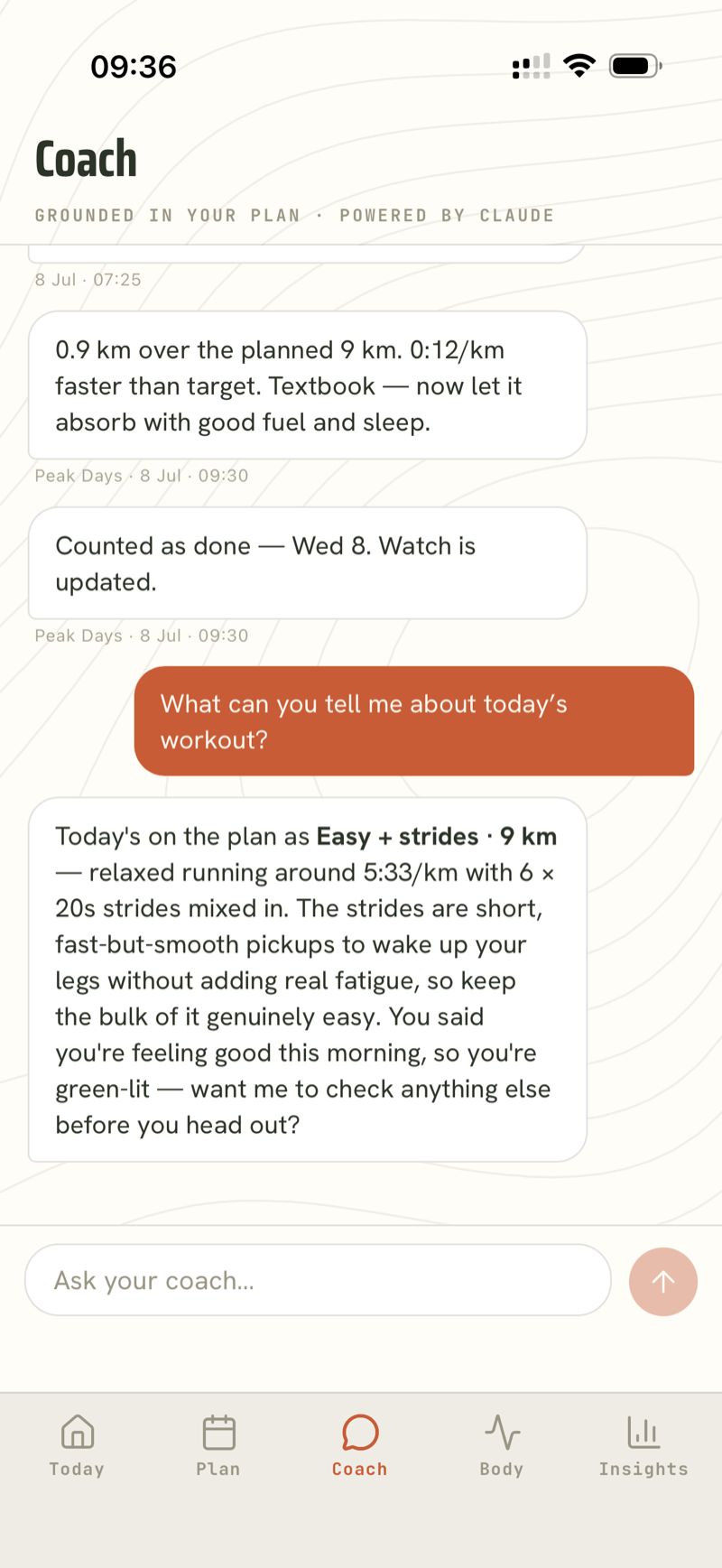 Coach chat explaining today's easy + strides workout, above proactive messages analysing yesterday's run and marking it done